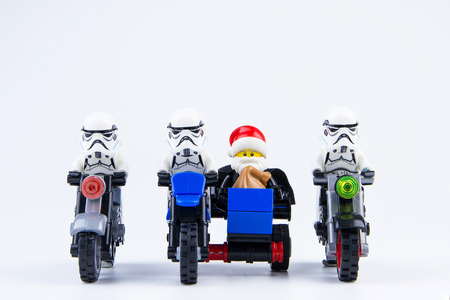 Nonthaburi, Thailand - November, 04, 2016 : Lego star wars stormtrooper and Lego darth vader dressed as Santa Claus ride a motorcycle giving gifts at Christmas.Theme Christmas day background.のeditorial素材
