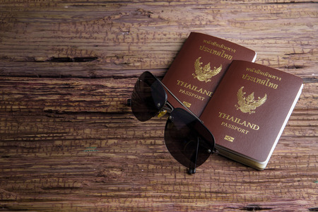 Thailand passport an official document issued by a government, certifying the holder's identity and citizenship and entitling them to travel under its protection to and from foreign countries.の写真素材