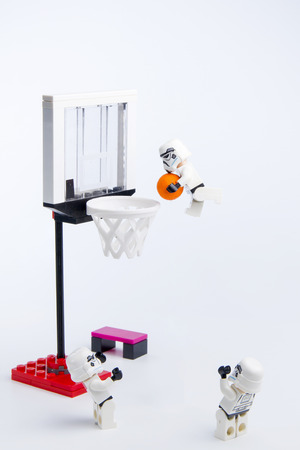 Nonthaburi, Thailand - November, 19, 2016: Lego star wars stormtrooper playing basketball at basketball court.Sports background.Lego is an interlocking brick system collected around the world.のeditorial素材