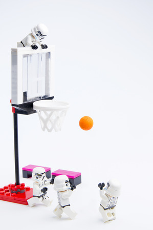 Nonthaburi, Thailand - November, 19, 2016: Lego star wars stormtrooper playing basketball at basketball court.Sports background.Lego is an interlocking brick system collected around the world.のeditorial素材