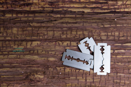 Stylish Professional Barber and salon, Razor, Haircut accessories on wood background with copy...