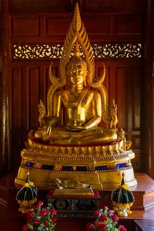 Uthai Thani, Thailand - December, 18, 2016 : Golden Buddha in Wat Tham Khao Wong, Thailand home style temple built in the middle of nature.Uthai Thani, Uthai Thani is small town in central Thailandのeditorial素材