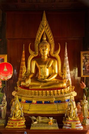 Uthai Thani, Thailand - December, 18, 2016 : Golden Buddha in Wat Tham Khao Wong, Thailand home style temple built in the middle of nature.Uthai Thani, Uthai Thani is small town in central Thailandのeditorial素材