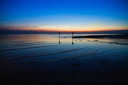 Seagull bird with amazing colorful sky and sea on twilight sunset time seascape.Nature background.の写真素材