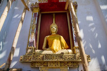 Golden Buddha Statue in under construction temple at Wat Somdej Sangkhlaburi, Kanchanaburi.Thailand.の写真素材