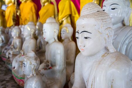 White Buddha Statue in temple at Wat Somdej Sangkhlaburi, Kanchanaburi.Thailand.のeditorial素材