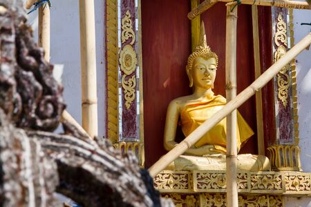 Golden Buddha Statue in under construction temple at Wat Somdej Sangkhlaburi, Kanchanaburi.Thailand.のeditorial素材