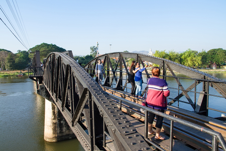 Kanchanaburi, Thailand - December, 25, 2016 : Unidentified Tourist walk on The Railway Bridge on the River Kwai at Kanchanaburi,Thailand.This bridge is famous for its history in second world warのeditorial素材