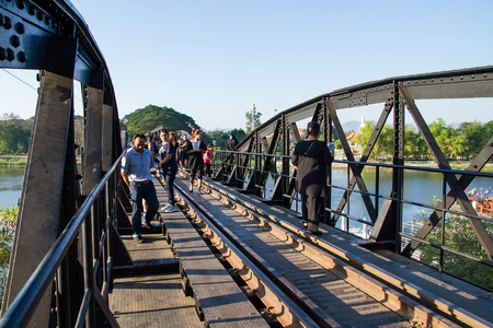 Kanchanaburi, Thailand - December, 25, 2016 : Unidentified Tourist walk on The Railway Bridge on the River Kwai at Kanchanaburi,Thailand.This bridge is famous for its history in second world warのeditorial素材