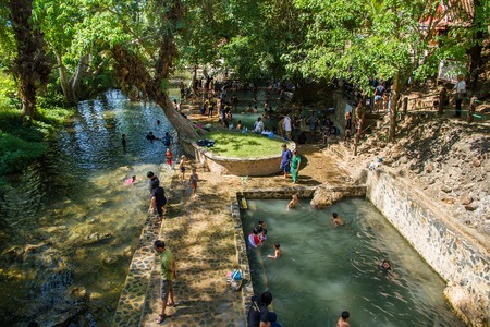 Kanchanaburi, Thailand - December, 25, 2016 : Unidentified Tourists soak hot springs at Hin Dat Hot Spring , Kanchanaburi , Thailand.のeditorial素材