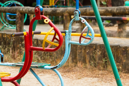 Colorful children swing in playground.Toys for children.の写真素材