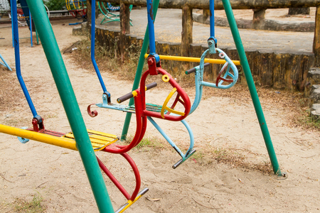 Colorful children swing in playground.Toys for children.の写真素材