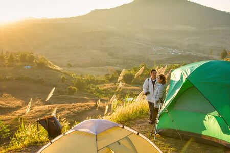 Phetchabun, Thailand - January, 22, 2017 : Tourist Camping on the hill with sunshine in the sunrise at Takhian Ngoa Mountain Phetchabun, Thailand.Natural summer landscape.のeditorial素材