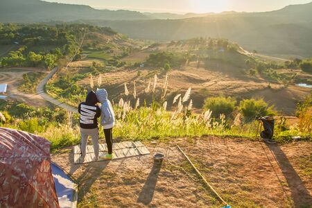 Phetchabun, Thailand - January, 22, 2017 : Tourist Camping on the hill with sunshine in the sunrise at Takhian Ngoa Mountain Phetchabun, Thailand.Natural summer landscape.のeditorial素材
