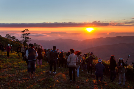 Phetchabun, Thailand - January, 21, 2017 : Tourists come to see and photograph the sunrise in the morning at Phu Lom Lo, Phu Hin Rong Kla National Park, Phetchabun, Thailand.のeditorial素材