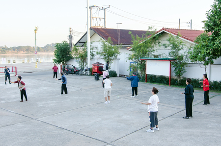 Nongkhai, Thailand - February, 05, 2017 : Unidentified name People exercise Tai Chi at Mekong Riverside morning sunrise, Nongkhai, Thailandのeditorial素材