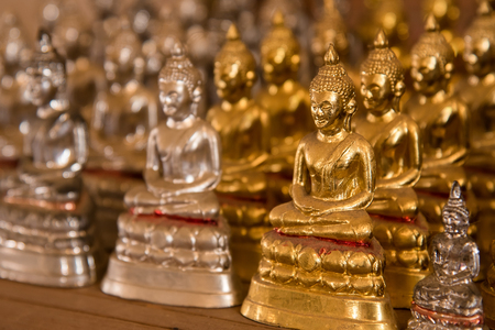 Little buddha statues in temple Thailandの写真素材