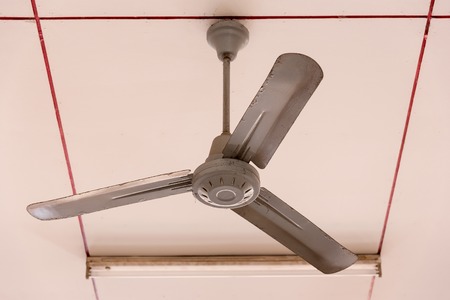 Electric ceiling fan over a canopy on an event.の写真素材