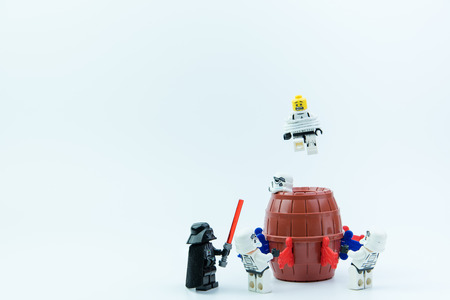 Nonthaburi, Thailand-March,07,2017:Lego star wars stormtrooper playing pirate barrel toy with a small plastic knife inserted into the barrel only one button to make the doll bounce out of the barrel.のeditorial素材