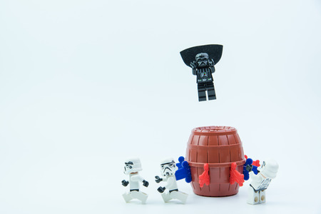 Nonthaburi, Thailand-March,07,2017:Lego star wars stormtrooper playing pirate barrel toy with a small plastic knife inserted into the barrel only one button to make the doll bounce out of the barrel.のeditorial素材