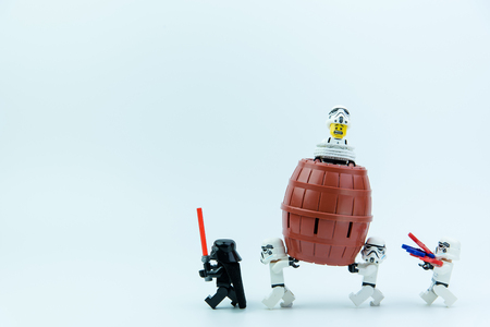 Nonthaburi, Thailand-March,07,2017:Lego star wars stormtrooper playing pirate barrel toy with a small plastic knife inserted into the barrel only one button to make the doll bounce out of the barrel.のeditorial素材