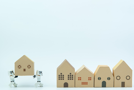 Nonthaburi, Thailand - March, 07, 2017 : Lego star wars stormtrooper help together carry the paper house.Real estate concept, New house concept.のeditorial素材