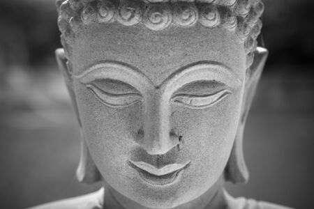 Ayutthaya, Thailand - March, 11, 2017 : Close up face of Buddha sandstone statue in Wat cheing len temple Thailand, Black and white pictureのeditorial素材