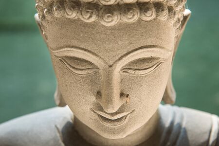 Ayutthaya, Thailand - March, 11, 2017 : Close up face of Buddha sandstone statue in Wat cheing len temple Thailand.のeditorial素材