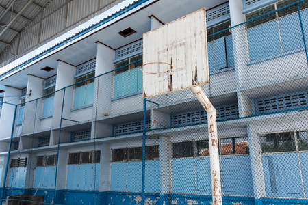 The old basketball hoop in the schoolの写真素材