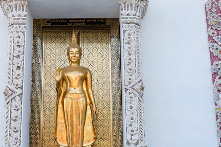 Ayutthaya, Thailand - March, 11, 2017 : Standing golden buddha statue in front of the church at Wat cheing len temple Thailandのeditorial素材