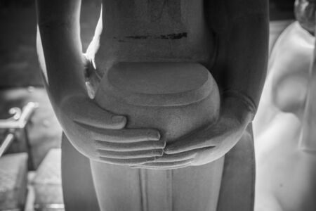 Ayutthaya, Thailand - March, 11, 2017 : Close up of Buddha sandstone statue in Wat cheing len temple Thailand, black and white pictureのeditorial素材