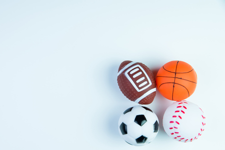 Football toy, Baseball toy, Basketball toy and Rugby toy isolated on white background with copy space.Concept winner of the sportの写真素材