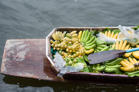Close up of Banana on the boat in floating market at Bangkok, Thailandの写真素材