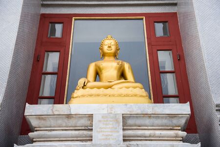 Prachuap Khiri Khan, Thailand - April, 18, 2017 : Golden Buddha statue in Wat Thang Sai on mountain Thongchai, The important temple in Baangrood, Prachuapkhirikhan Thailand.のeditorial素材