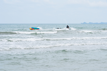 Prachuap Khiri Khan, Thailand - April, 18, 2017 : Water amusement on banana boat. summer holiday by the sea at Thongchai Sub district, Bangsapan District, Prachuap Khiri Khan, Thailandのeditorial素材