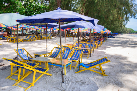 Prachuap Khiri Khan, Thailand - April, 18, 2017 : Sun umbrellas in the warm sandy beach of the tourist at Lime bay in Thongchai Sub district, Bangsapan District, Prachuap Khiri Khan, Thailandのeditorial素材