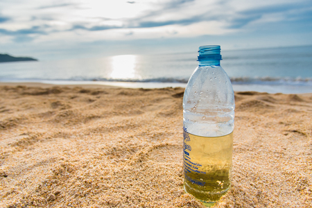 Prachuap Khiri Khan, Thailand - April, 18, 2017 : Plastic water bottle on the beach at Prachuap Khiri Khan, Thailandのeditorial素材