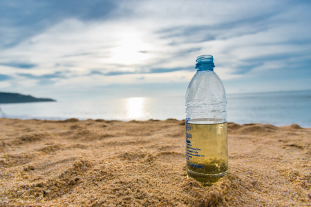 Prachuap Khiri Khan, Thailand - April, 18, 2017 : Plastic water bottle on the beach at Prachuap Khiri Khan, Thailandのeditorial素材