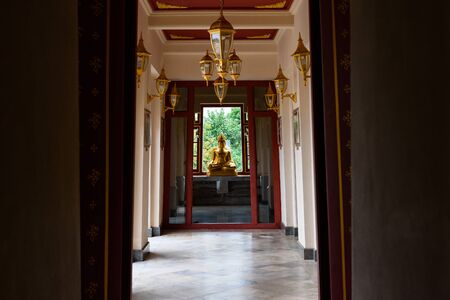 Prachuap Khiri Khan, Thailand - April, 18, 2017 : Golden Buddha statue in Wat Thang Sai on mountain Thongchai, The important temple in Baangrood, Prachuapkhirikhan Thailand.のeditorial素材