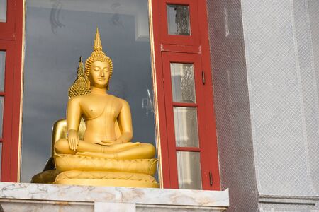 Prachuap Khiri Khan, Thailand - April, 18, 2017 : Golden Buddha statue in Wat Thang Sai on mountain Thongchai, The important temple in Baangrood, Prachuapkhirikhan Thailand.のeditorial素材