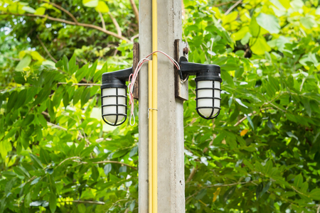 White lamp post on the poleの写真素材