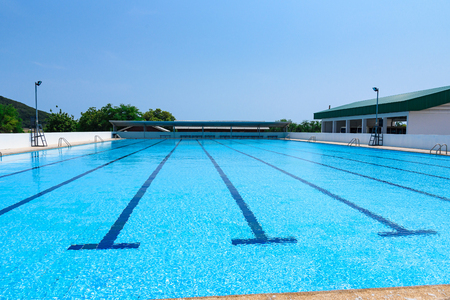 Blue swimming pool at sport centerの写真素材