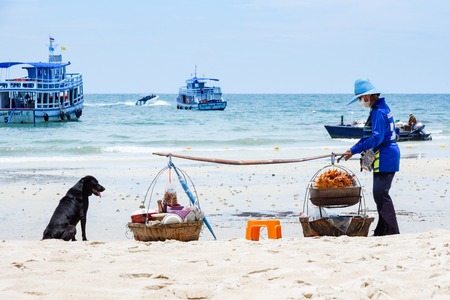 Rayong, Thailand - April, 29, 2017 : Unidentified name Woman Selling Somtum Grilled Chicken, Local Food on the Samet Island Beach, Rayong, Thailandのeditorial素材