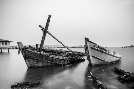 Chon Buri, Thailand - April, 27, 2017 : Long exposure technique of shipwreck or abandoned shipwreck in the sea at Sattahip, Chon Buri, Thailand.Black and white pictureのeditorial素材