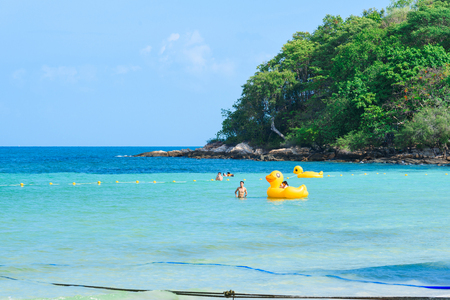 Rayong, Thailand - April, 28, 2017 : Unidentified name Tourists are playing in the sea with Inflatable yellow duck swim tube at the Koh Samet island, Rayong, Thailandのeditorial素材