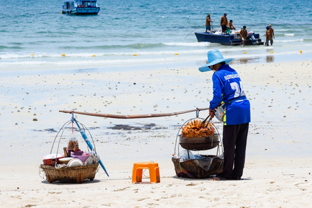 Rayong, Thailand - April, 29, 2017 : Unidentified name Woman Selling Somtum Grilled Chicken, Local Food on the Samet Island Beach, Rayong, Thailandのeditorial素材