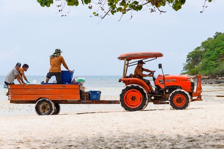 Rayong, Thailand - April, 28, 2017 : Red tractor on the beach at the Koh Samet island, Rayong, Thailandのeditorial素材