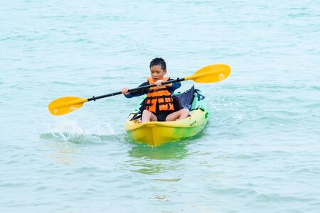 Rayong, Thailand - April, 28, 2017 : Unidentified name Boy kayaking on the sea at the Koh Samet island, Rayong, Thailandのeditorial素材