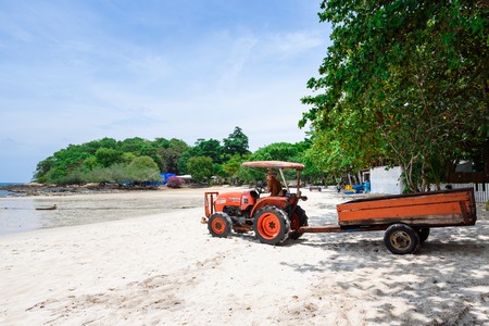 Rayong, Thailand - April, 28, 2017 : Red tractor on the beach at the Koh Samet island, Rayong, Thailandのeditorial素材