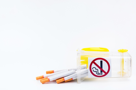 Cigarettes in to the dumps.No Smoking Day background.Anti smokingの写真素材